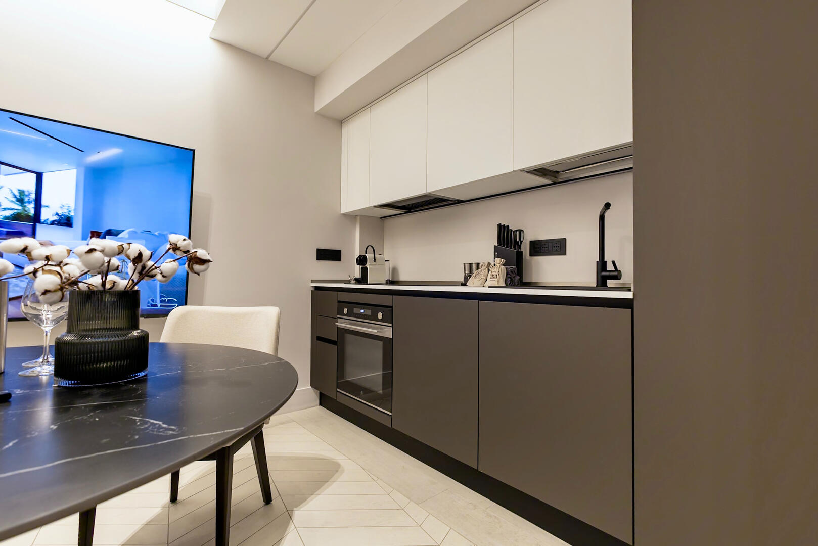 Sleek kitchen with appliances ready for gourmet meals.